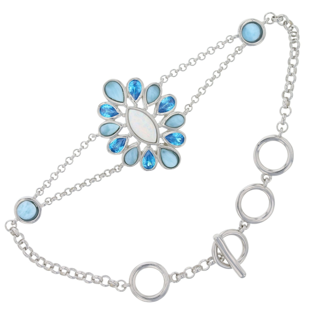 Sterling Silver Natural LarimarCreated White Opal and Aqua CZ Toggle Flower  Bracelet Image 1