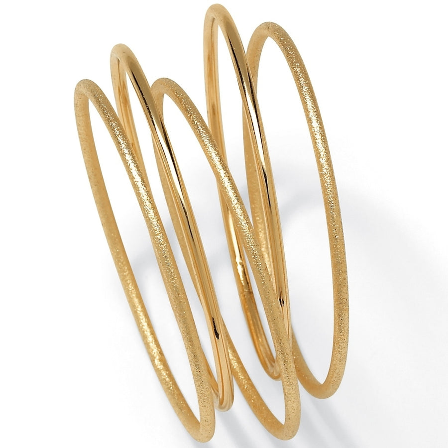 5 Piece Bangle Bracelet Set in Textured and Polished Yellow Gold Tone Image 1