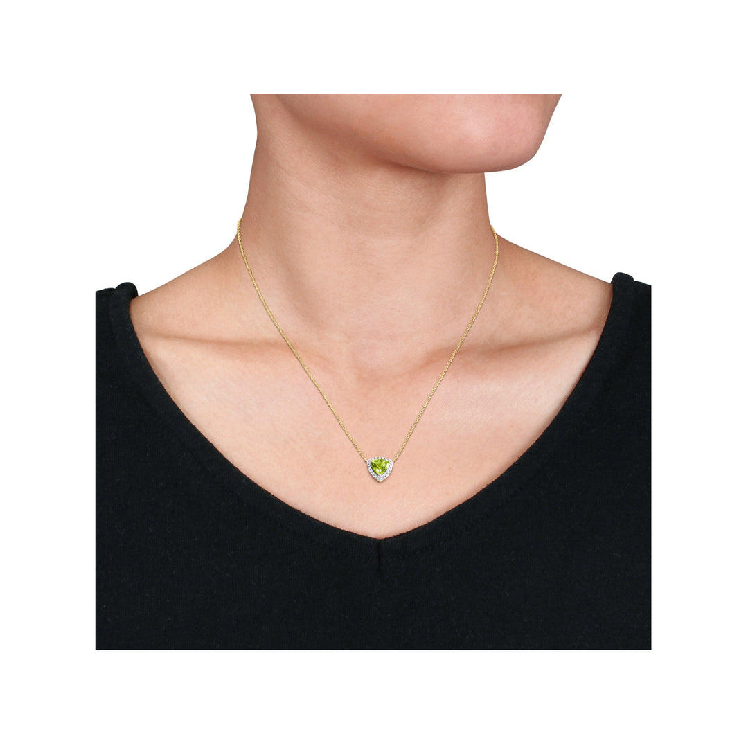 1.50 Carat (ctw) Trillion Peridot Pendant Necklace in 10K Yellow Gold with White Topaz and Chain Image 2