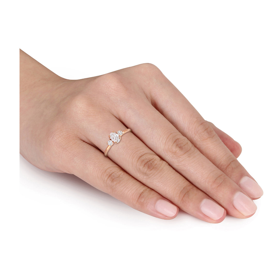 1.00 Carat (ctw H-II1-I2) Oval-Cut Three-Stone Diamond Engagement Ring in 14K Rose Gold Image 3