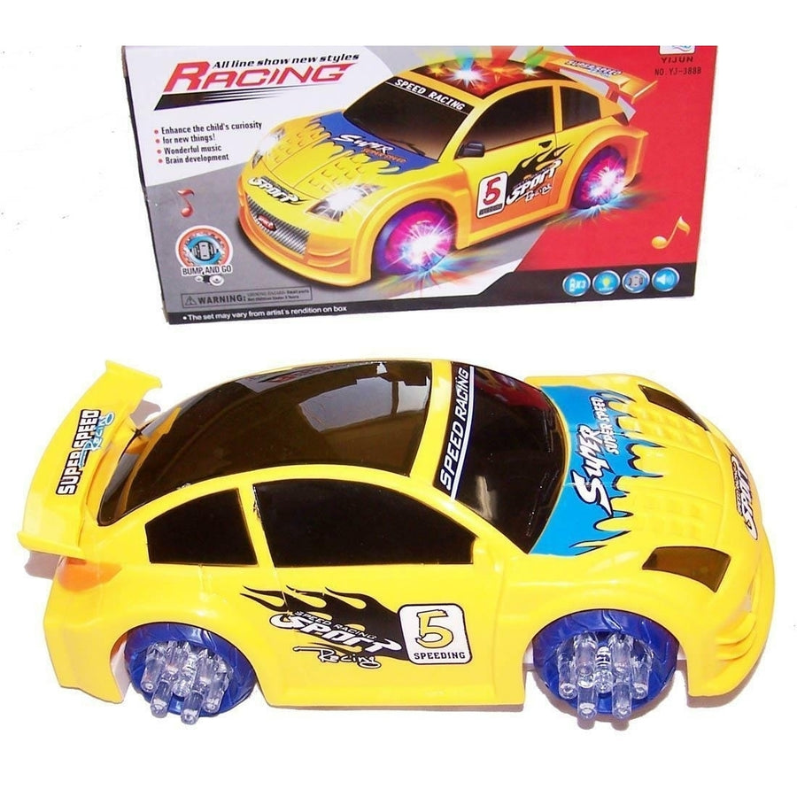 YELLOW BATTERY OPERATED BUMP AND GO RACE CAR light up racing toy flashing music Image 1