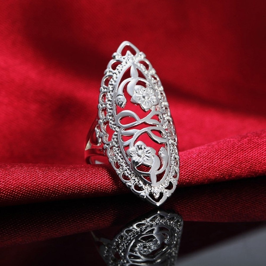 Silver Plated Alloy Hollow Carving Flower Finger Ring Womens Jewelry Gift Image 1