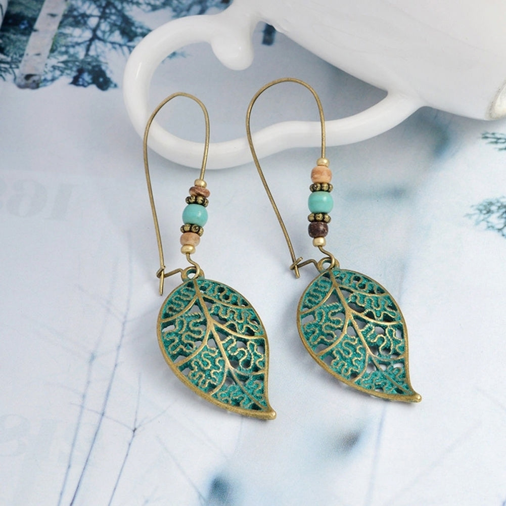 Fashion Women Hollow Leaves Dangle Hook Beads Earring Bohemia Charm Jewelry Image 2