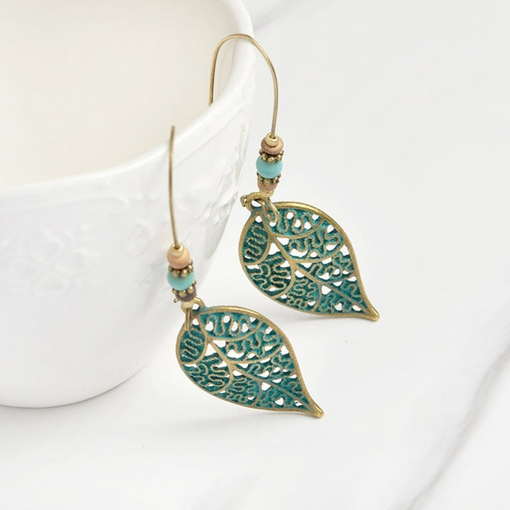 Fashion Women Hollow Leaves Dangle Hook Beads Earring Bohemia Charm Jewelry Image 3