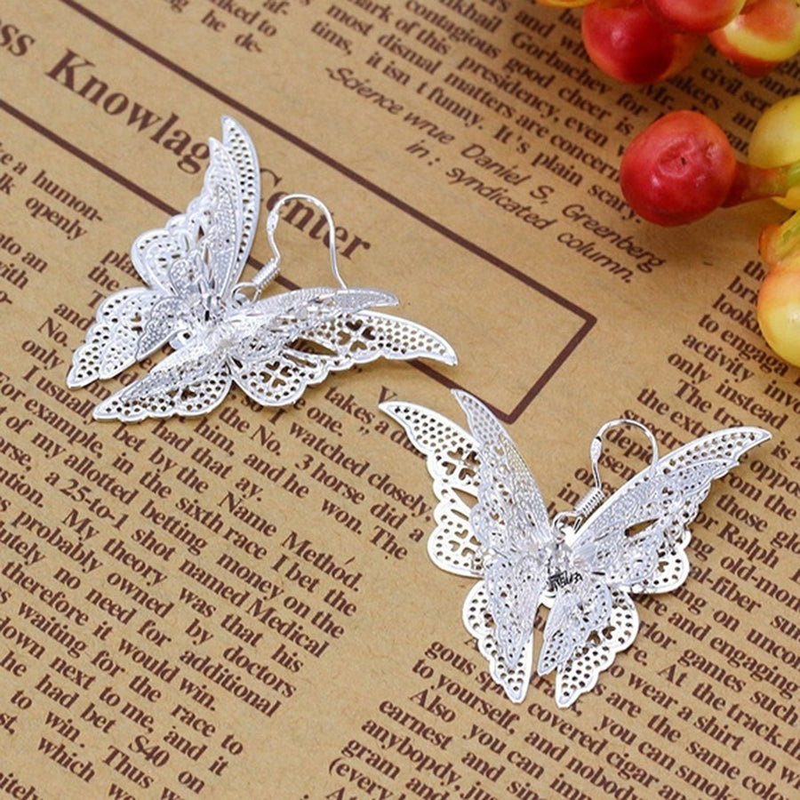 Fashion Lady Hollow Butterfly Charm Pendant Dangle Earrings Eardrop Jewelry Gift Image 1