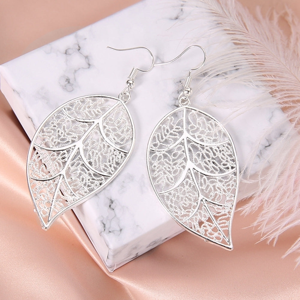 Fashion Women Hollow Carved Tree Leaf Pendant Dangle Drop Hook Earrings Jewelry Image 3