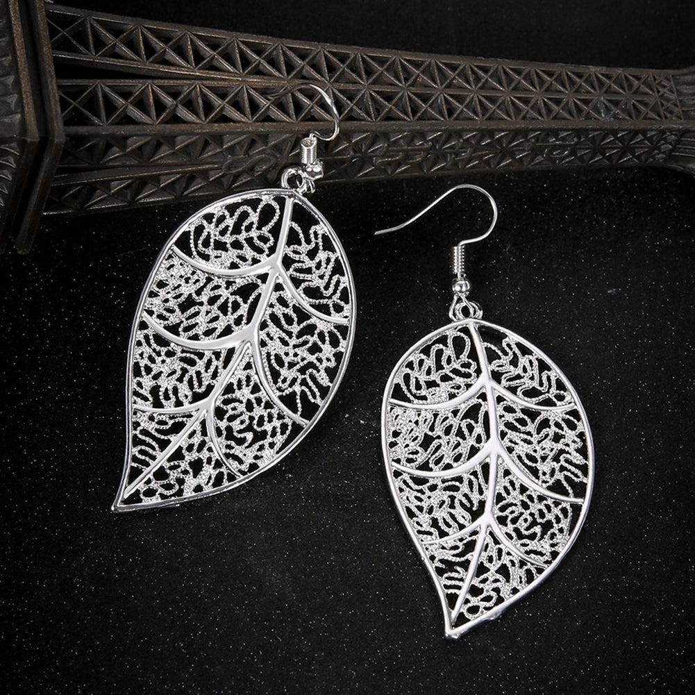 Fashion Women Hollow Carved Tree Leaf Pendant Dangle Drop Hook Earrings Jewelry Image 4