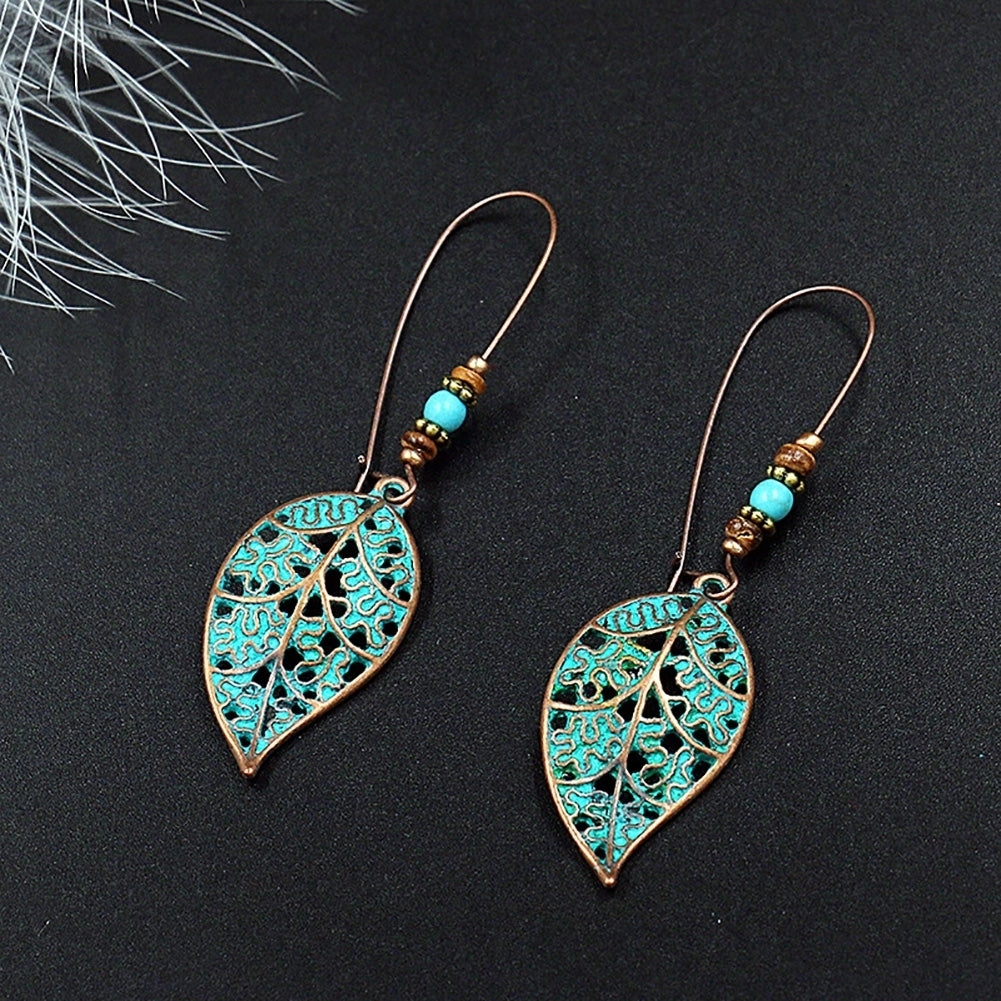 Retro Hollow Leaf Pendant Faux Turquoise Beaded Earrings Women Statement Jewelry Image 3