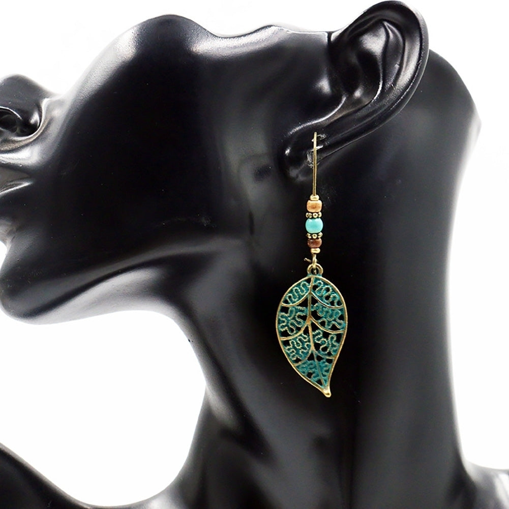 Retro Hollow Leaf Pendant Faux Turquoise Beaded Earrings Women Statement Jewelry Image 6