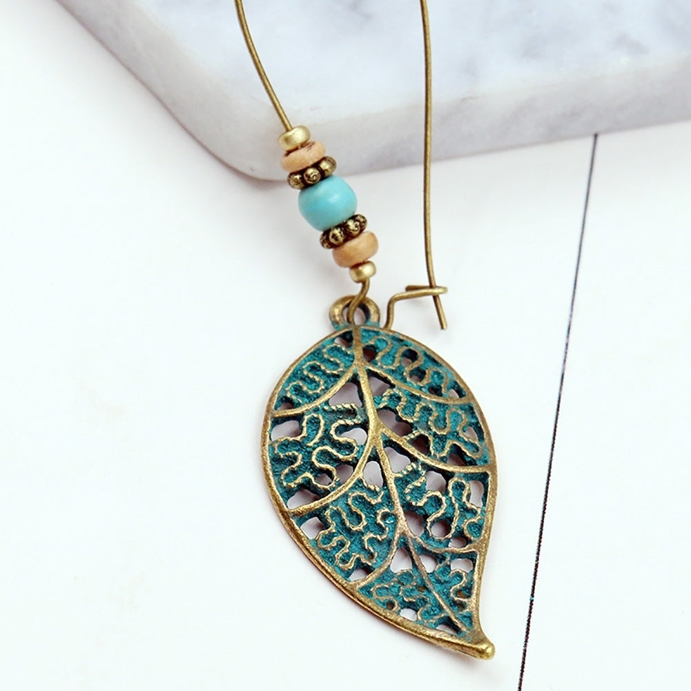 Retro Hollow Leaf Pendant Faux Turquoise Beaded Earrings Women Statement Jewelry Image 8