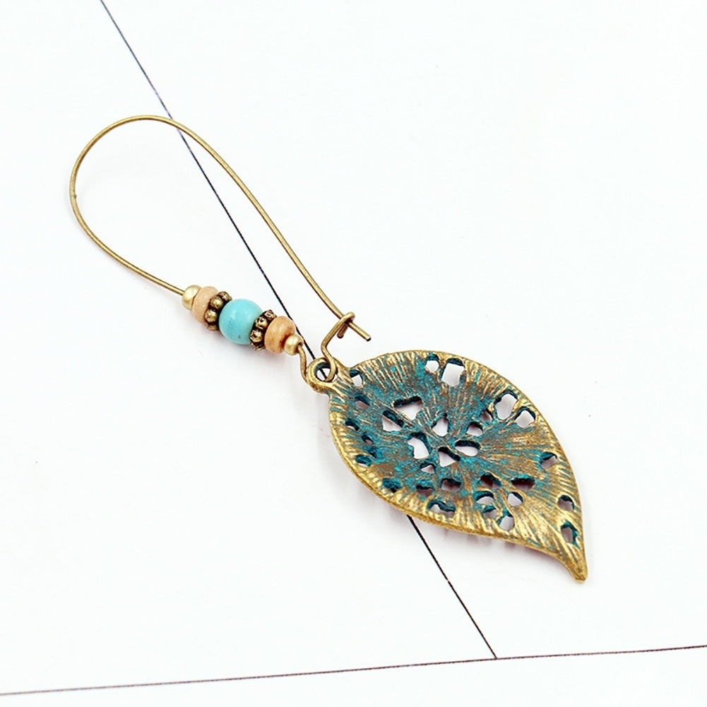 Retro Hollow Leaf Pendant Faux Turquoise Beaded Earrings Women Statement Jewelry Image 9