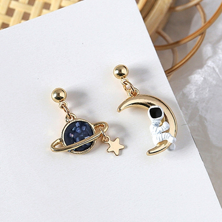 Creative Asymmetrical Astronaut Planet Moon Pendant Women Stud Earrings Jewelry Image 3