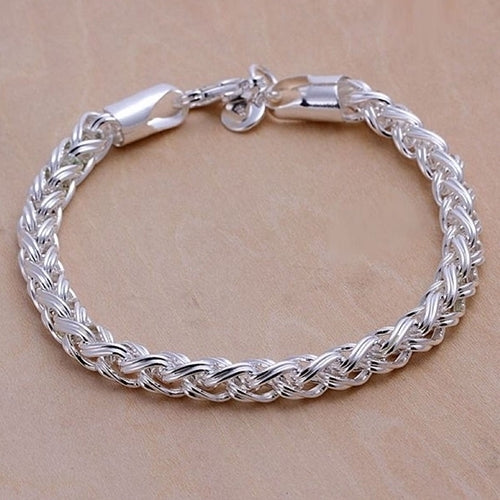 Womens Chic Simple Silver Plated Knotted Braided Chain Bangle Gift Bracelet Image 1