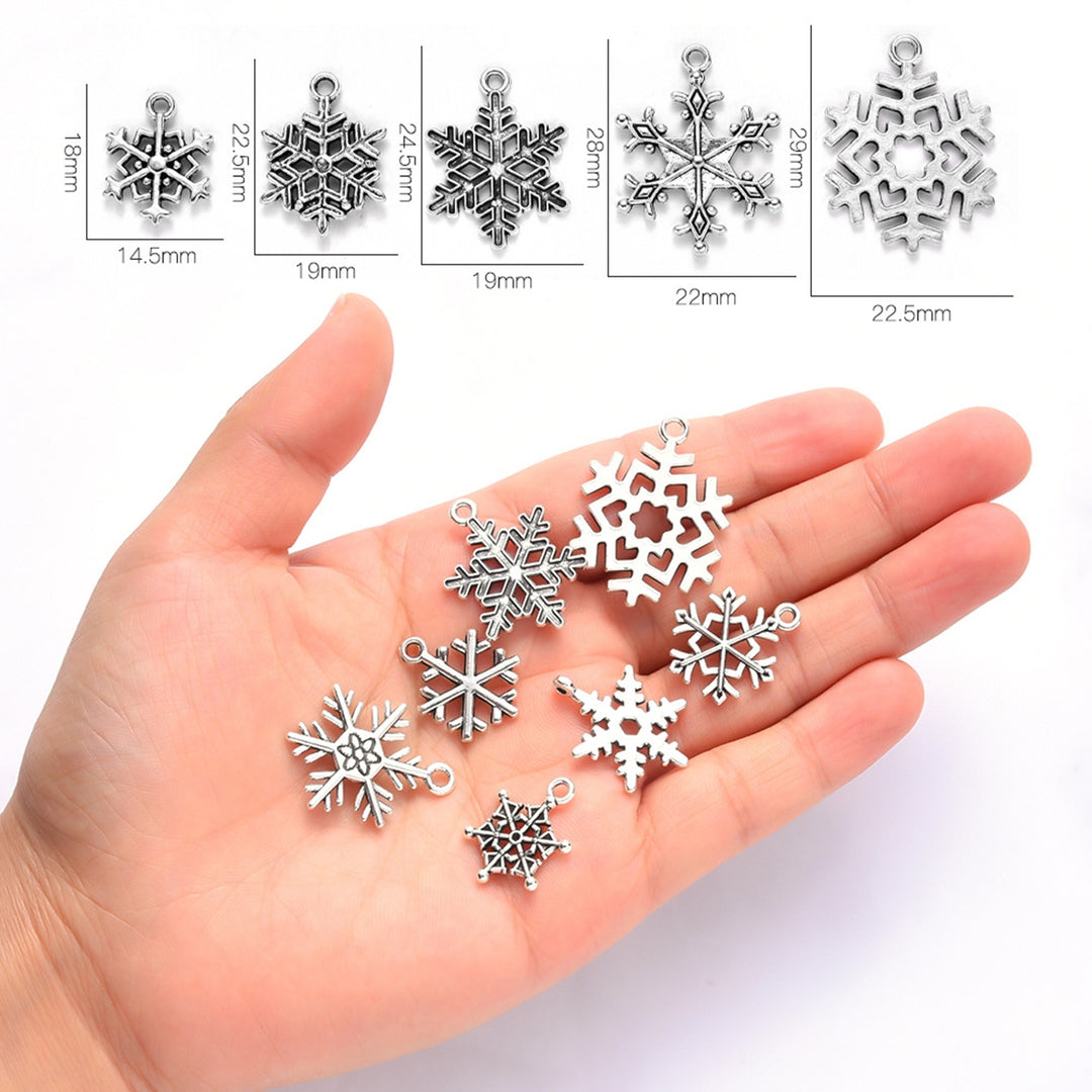 70Pcs Christmas Snowflake Charms 14 Styles Mixed DIY Antique Silver Pendants For Jewelry Making Image 4