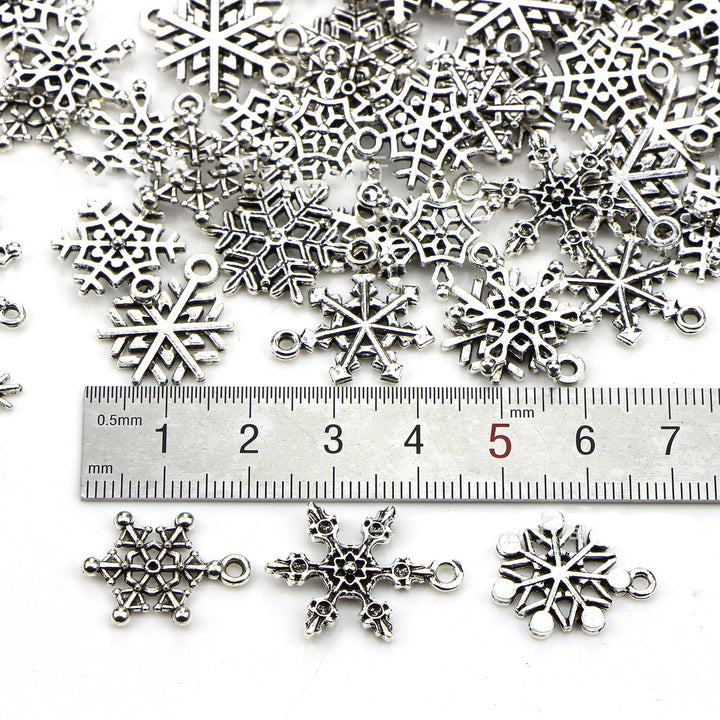 70Pcs Christmas Snowflake Charms 14 Styles Mixed DIY Antique Silver Pendants For Jewelry Making Image 8