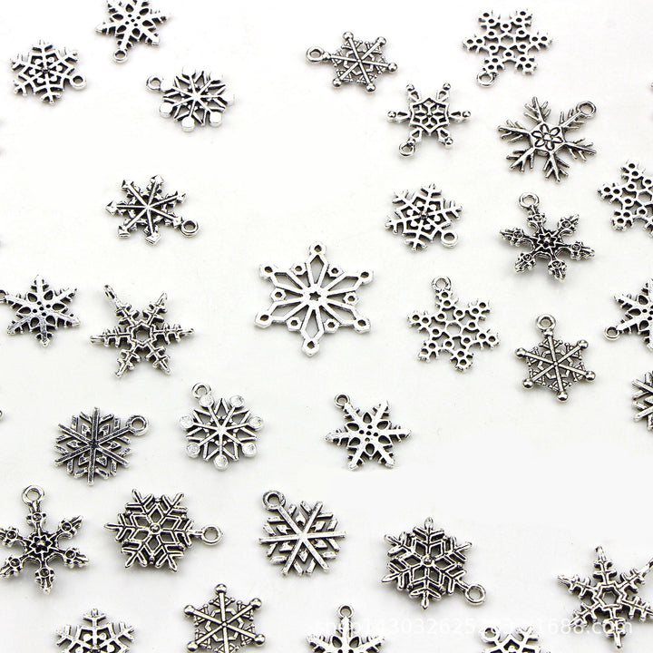 70Pcs Christmas Snowflake Charms 14 Styles Mixed DIY Antique Silver Pendants For Jewelry Making Image 9