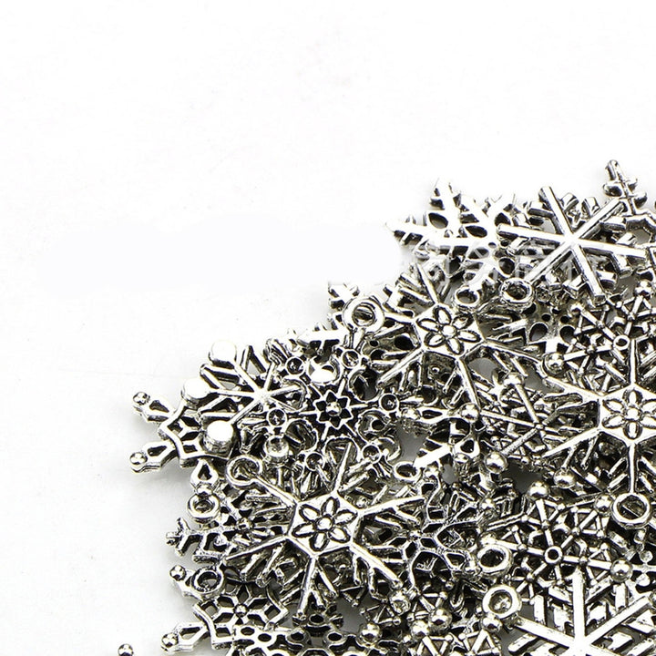 70Pcs Christmas Snowflake Charms 14 Styles Mixed DIY Antique Silver Pendants For Jewelry Making Image 11