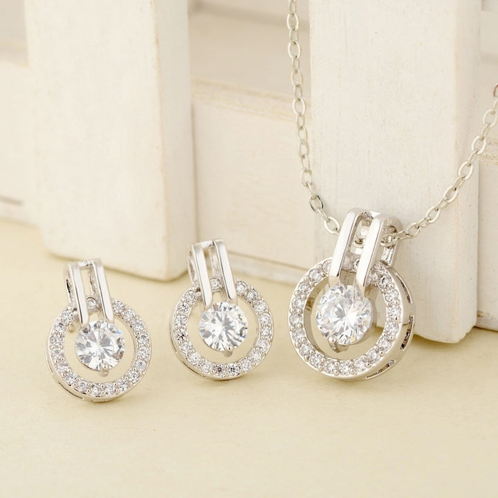 Women Full Cubic Zirconia Hollow Round Pendant Necklace Stud Earrings Jewelry Set Image 2