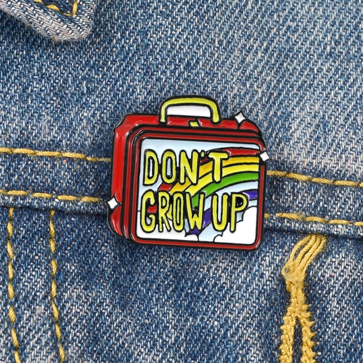 Dont Grow Up Hand Luggage Enamel Brooch Pin Denim Jacket Collar Backpack Badge Image 1