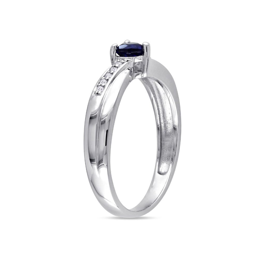 1/4 Carat (ctw) Lab-Created Blue Sapphire Heart Ring in Sterling Silver with Accent Diamonds Image 2