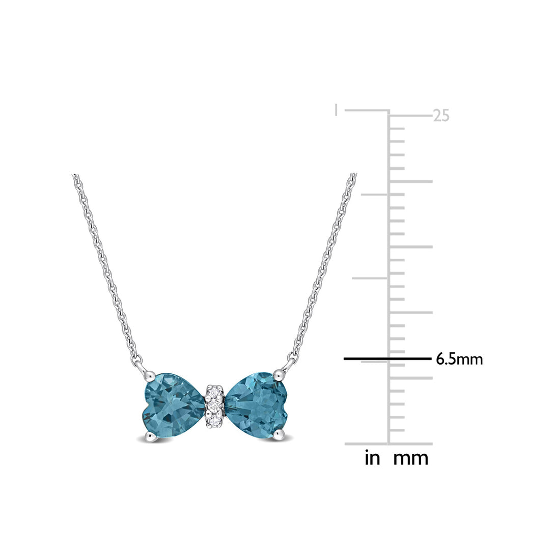 1.00 Carat (ctw) London Blue Heart Bow Pendant Necklace in 10K White Gold with Chain Image 3