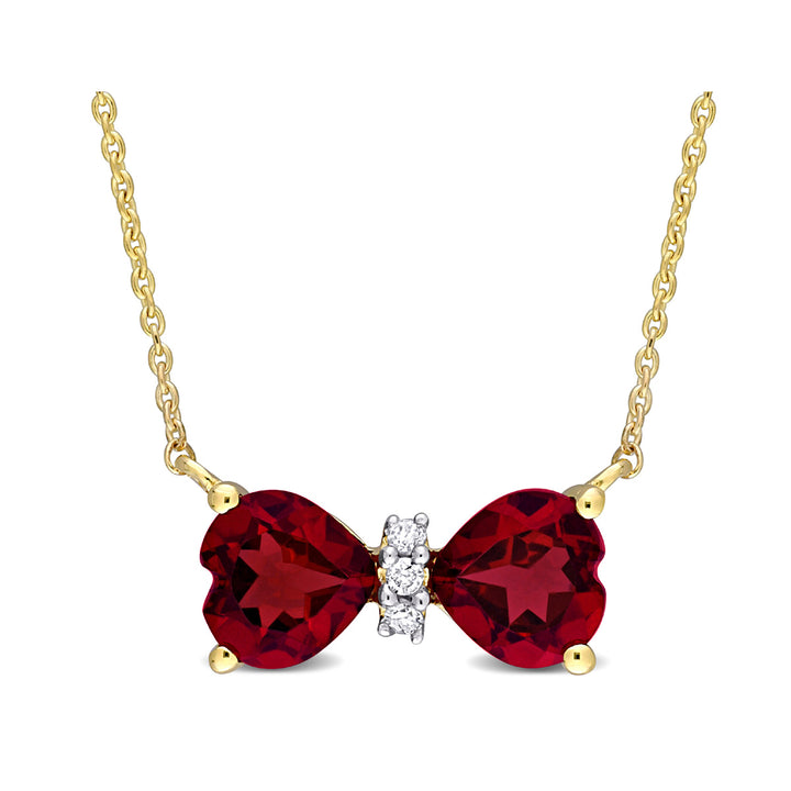 1.00 Carat (ctw) Garnet Heart Bow Pendant Necklace in 10K Yellow Gold with Chain Image 1