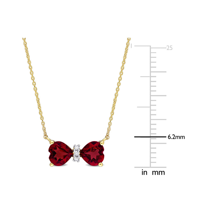 1.00 Carat (ctw) Garnet Heart Bow Pendant Necklace in 10K Yellow Gold with Chain Image 3