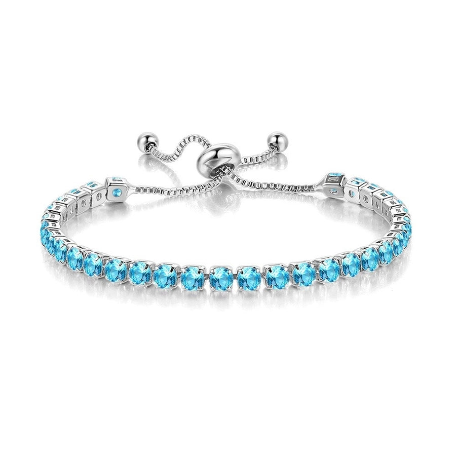 Paris Jewelry 10k White Gold Plated 6 Ct Round Created Aquamarine Sapphire CZ Tennis Bracelet for Adult Female by PJ Image 1