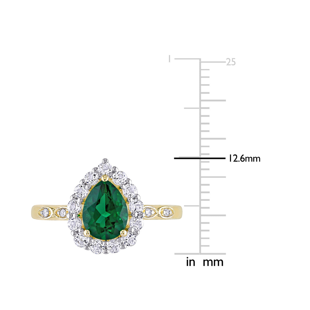 1.67 Carat (ctw) Lab-Created Green Emerald and White Topaz Halo Ring in 10K Yellow Gold Image 2