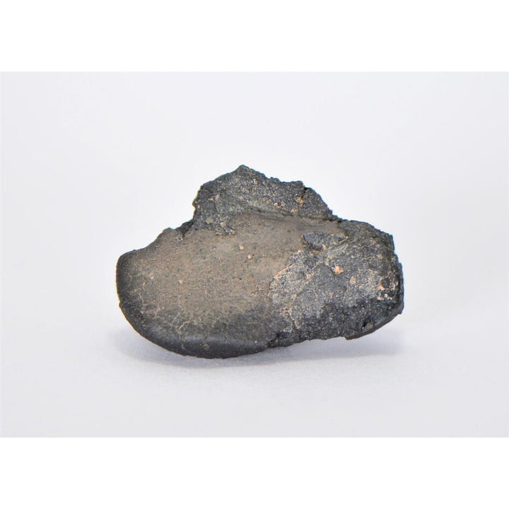 10.71g C3.00-ung Chwichiya 002 Carbonaceous Chondrite with Crust - TOP METEORITE Image 1