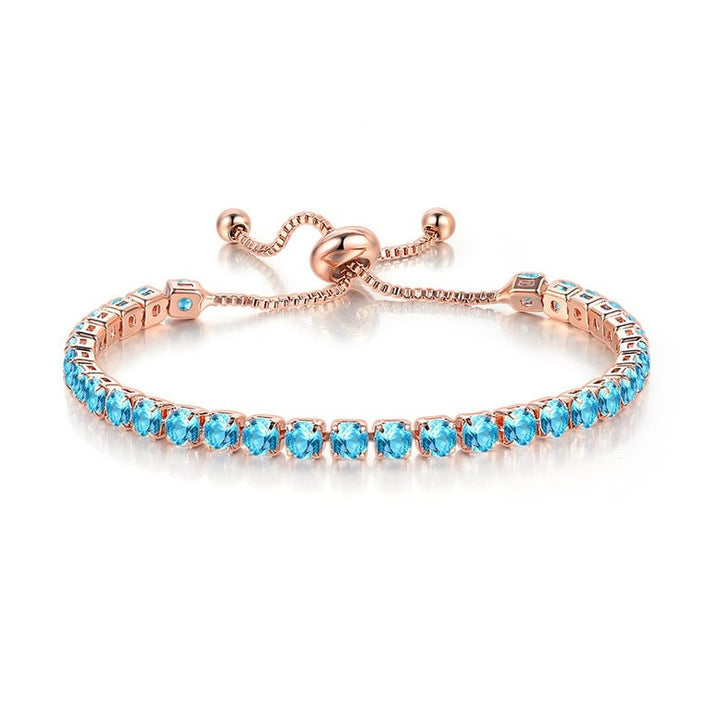 10k Rose Gold Plated Adjustable Tennis Bracelet 7 Cttw Created Blue Topaz Image 1