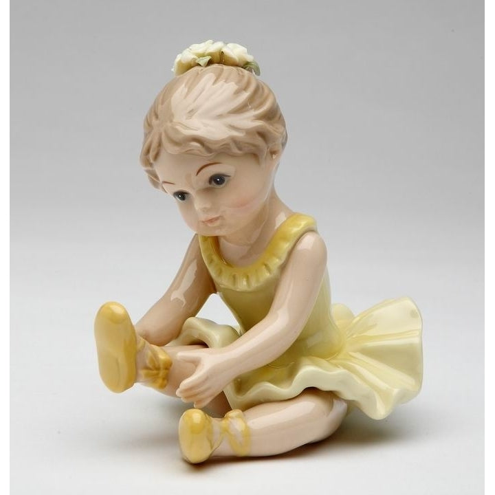 Ceramic Ballerina Figurine Yellow Stretching Leg Image 3