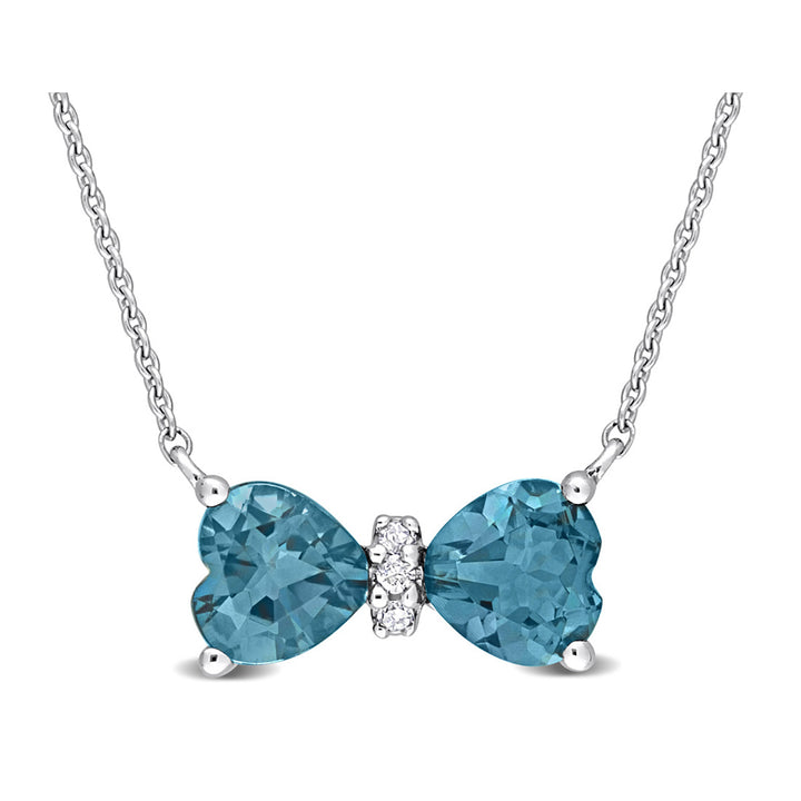 1.00 Carat (ctw) London Blue Heart Bow Pendant Necklace in 10K White Gold with Chain Image 1