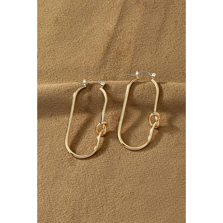 Brass oval hoop with love knots earrings Image 3