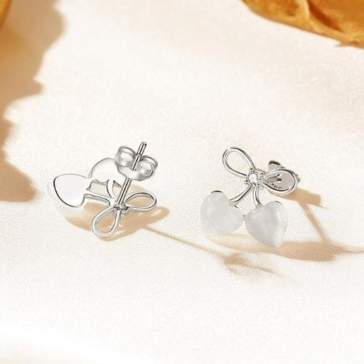 Love bow earrings for women in a cool style with diamond studded heart-shaped cats eye stone earrings Image 2