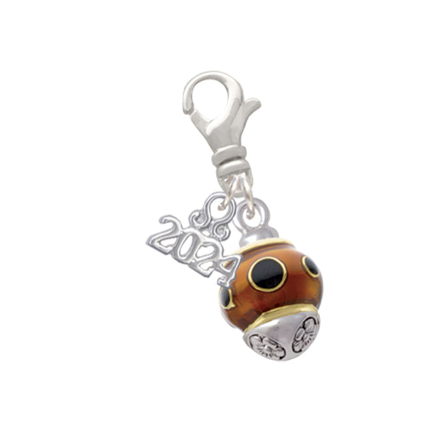 Delight Jewelry Goldtone Wide Black Dots on Translucent Brown Spinner Clip on Charm with Year 2024 Image 1