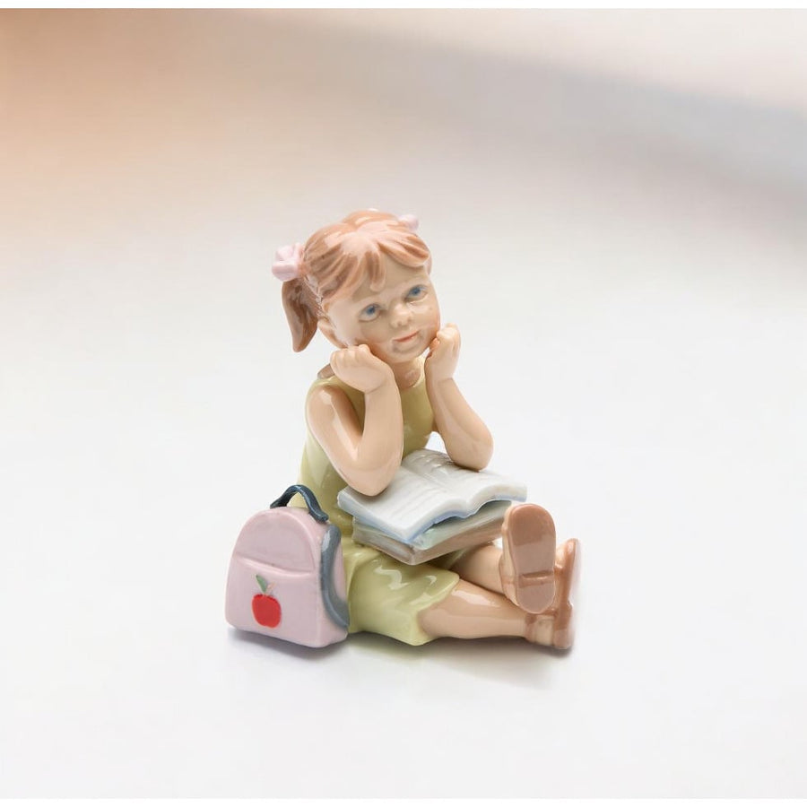 Ceramic Girl Doing Homework Figurine 5.375 Inches Image 1