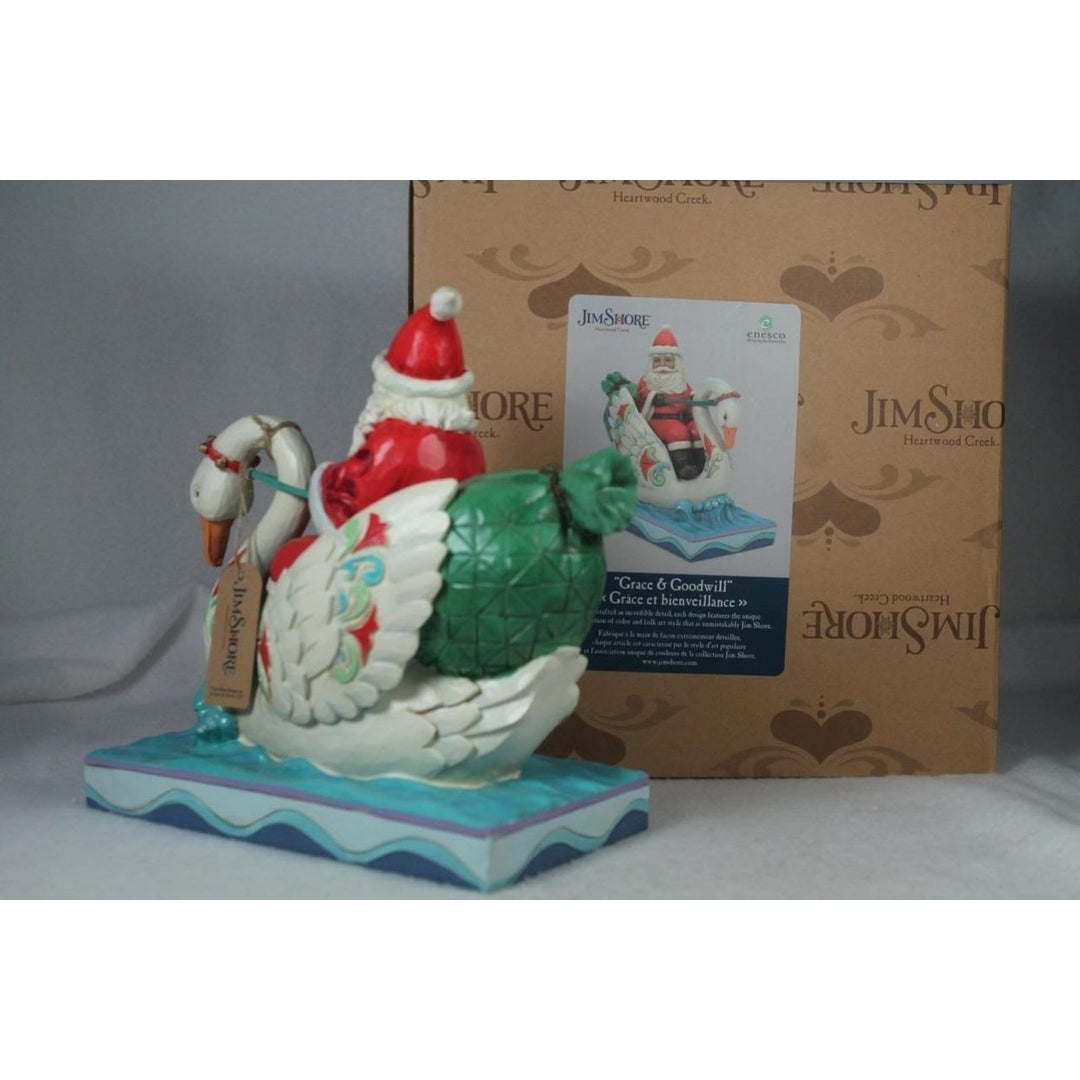 Jim Shore Grace and Goodwill Santa Riding Swan 2022 Figurine 6010824 Image 4