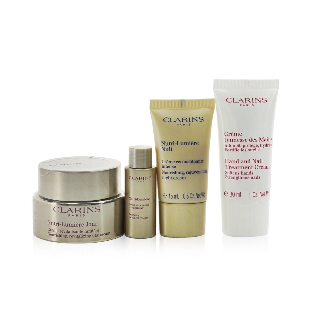 Clarins Nutri-Lumiere Collection: Day Cream 50ml+ Night Cream 15ml+ Treatment Essence 10ml+ Hand and Nail Treatment Image 1