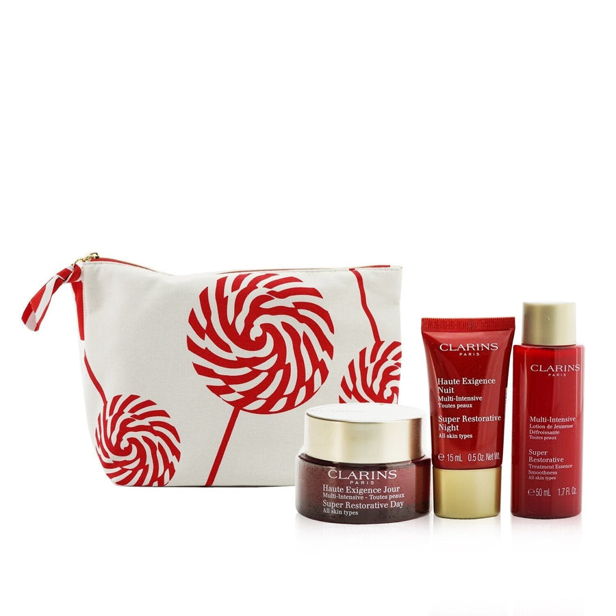 Clarins Super Restorative Collection: Day Cream 50ml+ Night Cream 15ml+ Treatment Essence 50ml+ Pouch 3pcs+1pouch Image 1