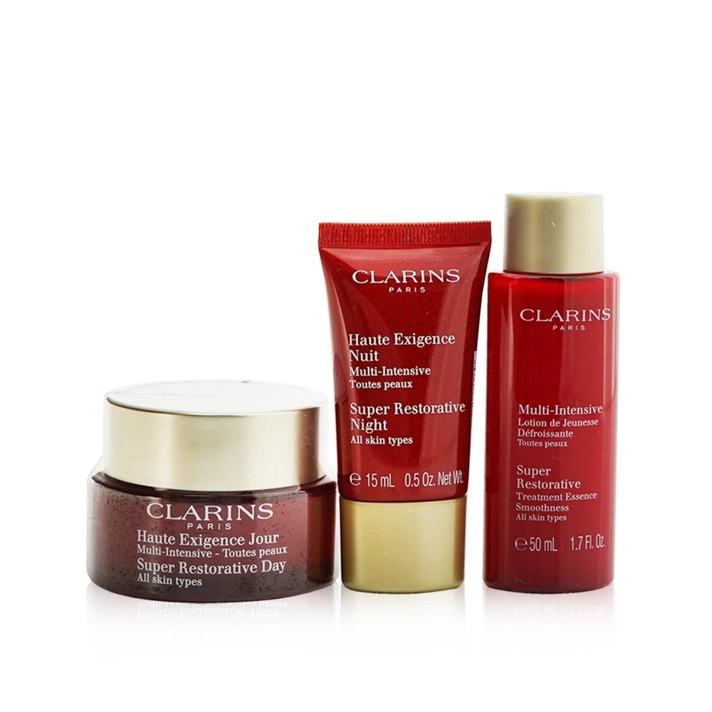 Clarins Super Restorative Collection: Day Cream 50ml+ Night Cream 15ml+ Treatment Essence 50ml+ Pouch 3pcs+1pouch Image 2