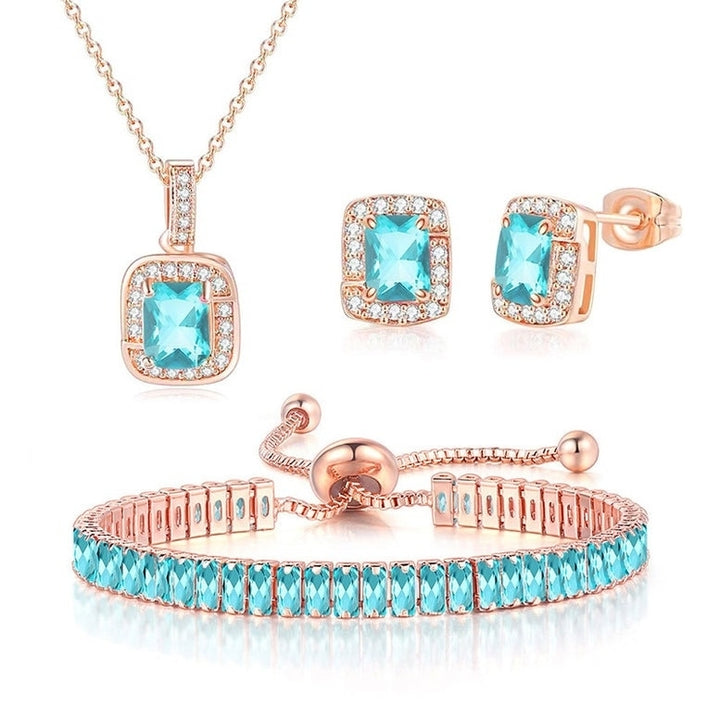 18K Rose Gold Created Blue Topaz Halo Necklace Earrings Tennis Bracelet Set Image 1