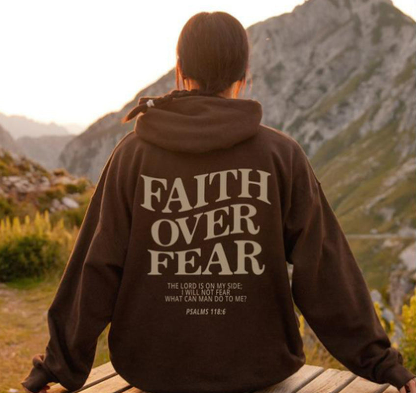 "Faith Over Fear Christian Sweatshirt with Bible Verse Design" Image 2