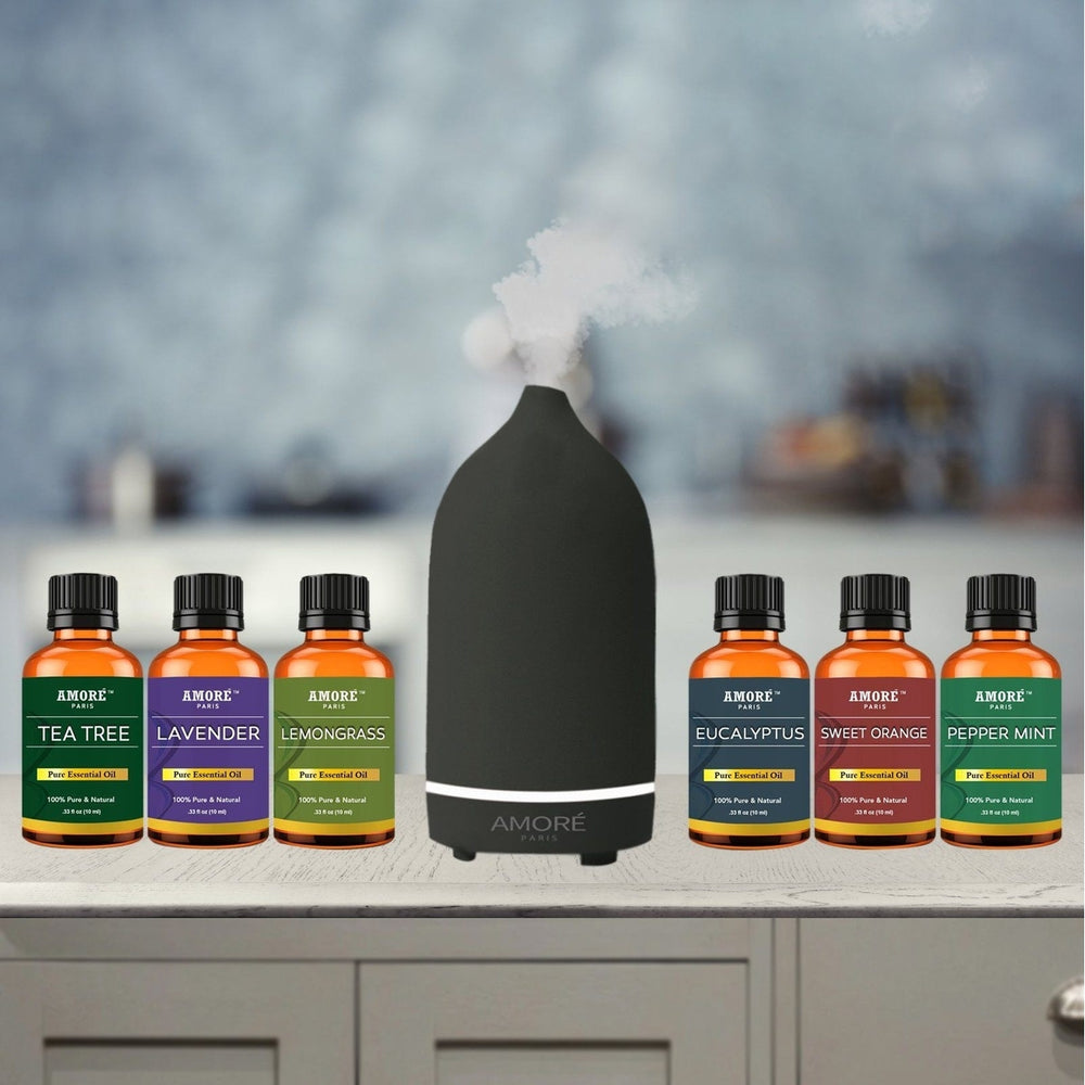 7-Piece: Ceramic Ultrasonic Aromatherapy Essential Oil Diffuser With Essential Oils Image 2