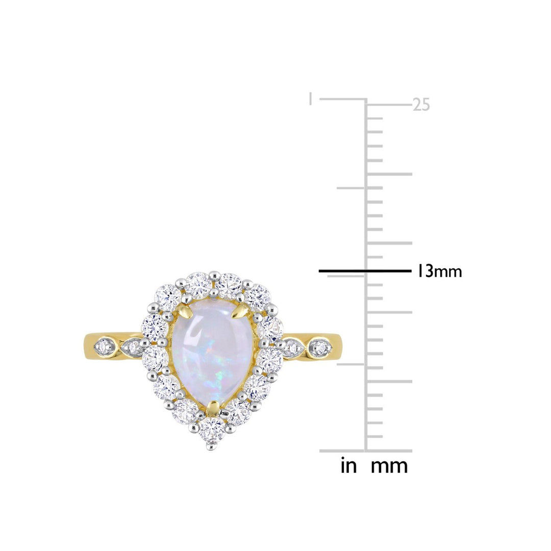 1.17 Carat (ctw) Opal and Lab-Created White Sapphire Halo Ring in 10K Yellow Gold Image 4