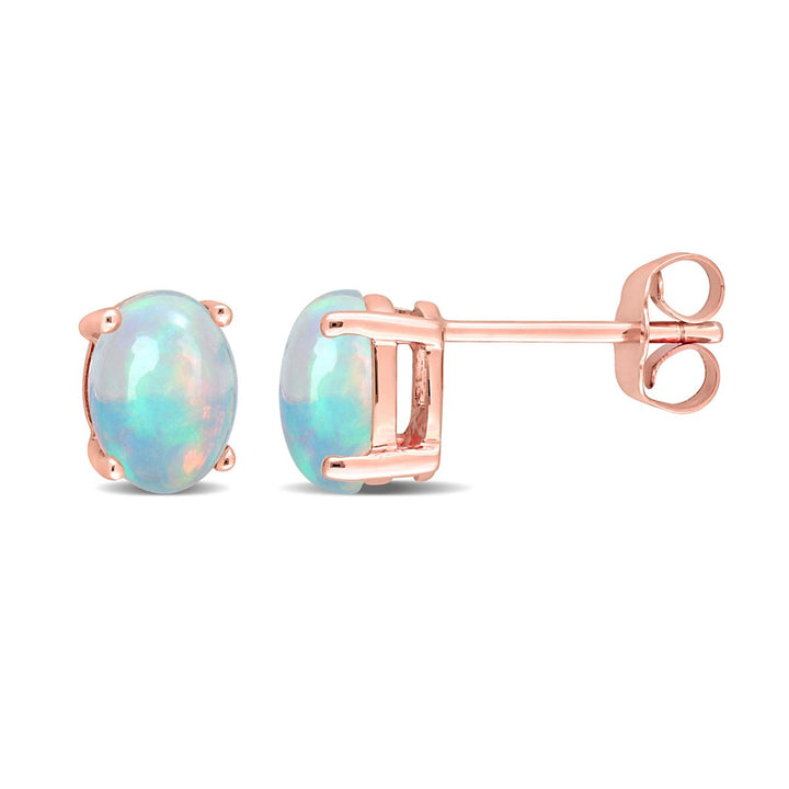 1.40 Carat (ctw) Oval Blue Ethiopian Opal Stud Earrings in 10K Rose Gold Image 1