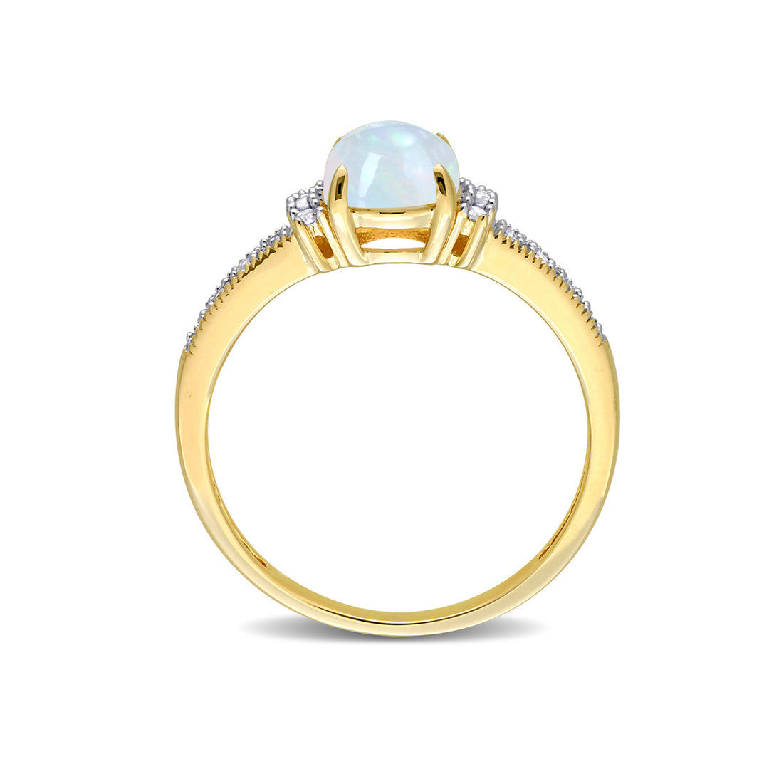 3/4 Carat (ctw) Oval Blue Opal Ring in 10K Yellow Gold Image 4